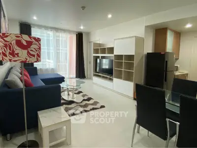 Modern living room with stylish furniture and open layout in a bright apartment.