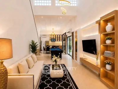 Spacious modern living room with elegant decor and open layout, featuring a pool table and stylish lighting.