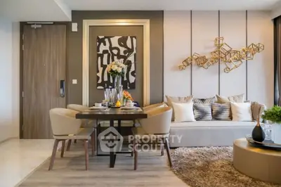 Modern living room with stylish decor and dining area, featuring elegant furniture and contemporary art.