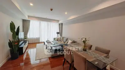 Spacious living room with elegant decor and natural light