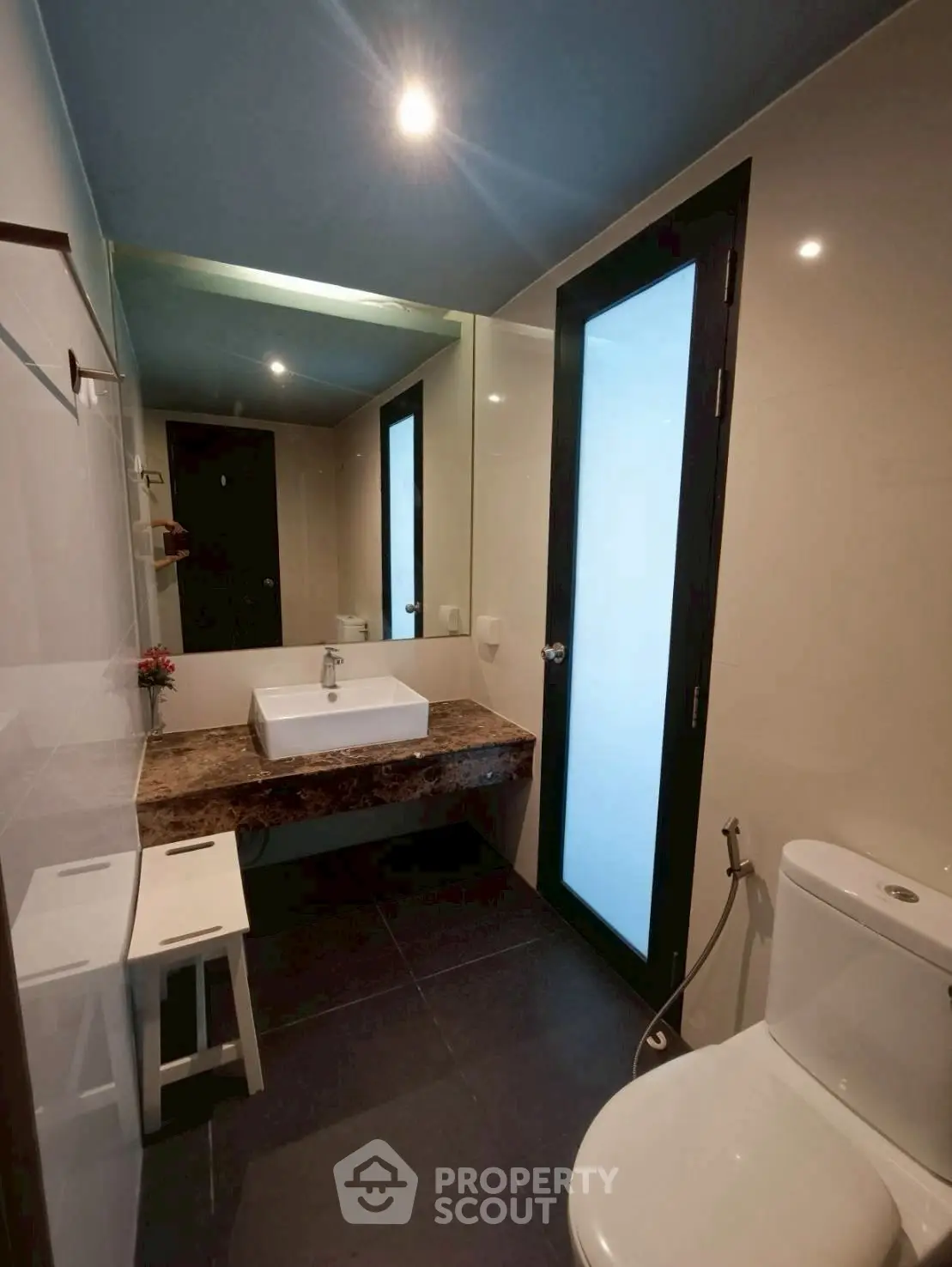 Modern bathroom with sleek fixtures and ambient lighting