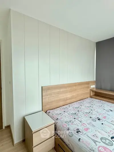 Cozy bedroom with modern wooden furniture and bright natural light