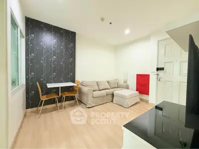 Cozy living room with modern decor and natural light