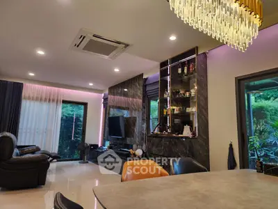 Luxurious modern living room with elegant lighting and stylish decor