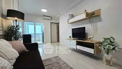 Modern living room with sleek TV unit and cozy decor