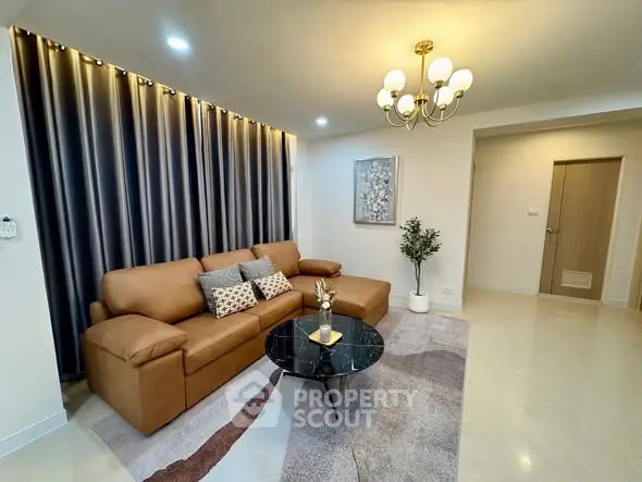 Elegant living room with modern decor and cozy seating area