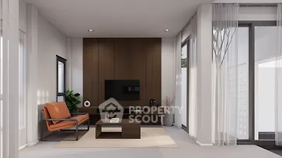 Modern living room with sleek furniture and large windows for natural light.