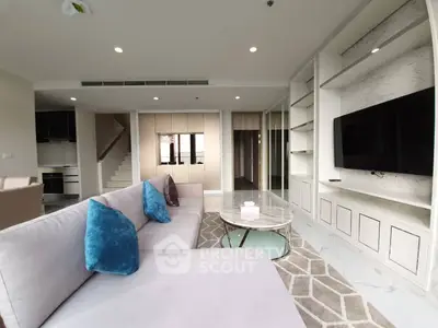 Spacious modern living room with elegant decor and large sectional sofa