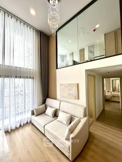 Luxurious high-ceiling living room with elegant decor and stunning city view
