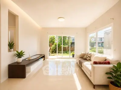Bright and spacious living room with garden view and modern decor