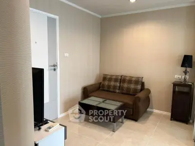 Cozy living room with modern decor and comfortable seating