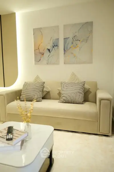 Modern living room with elegant sofa and abstract art decor