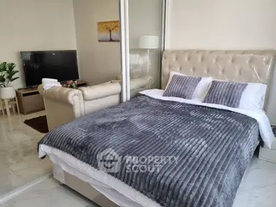 Luxurious bedroom with plush bed and elegant decor, perfect for relaxation.