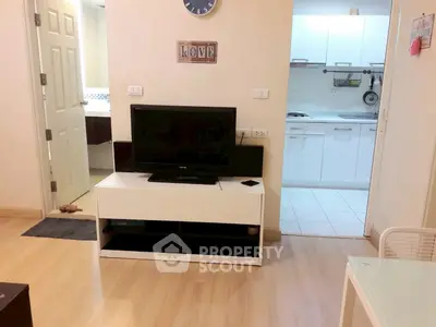 Modern living room with open kitchen layout and stylish decor