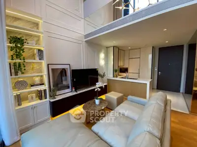 Luxurious modern living room with open kitchen and elegant decor