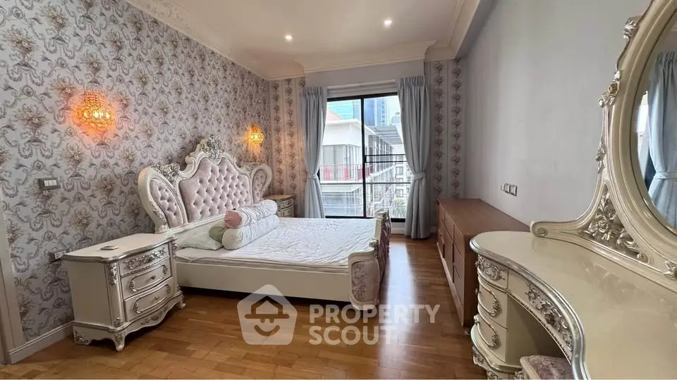 Luxurious bedroom with elegant furniture and city view, perfect for sophisticated living.
