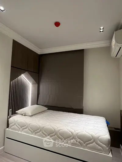 Modern bedroom with stylish decor and comfortable bed in a cozy apartment