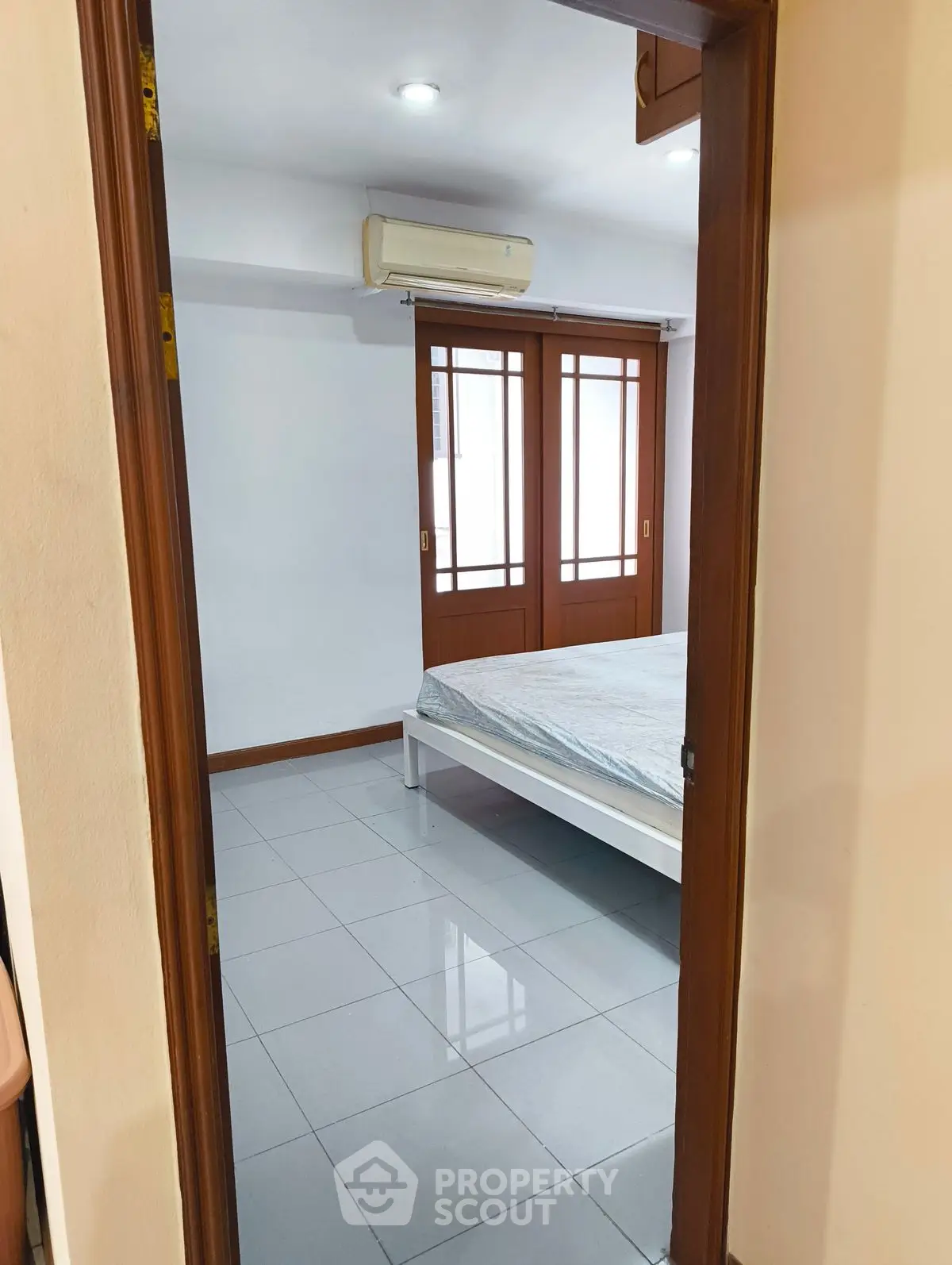 Cozy bedroom with minimalist design and air conditioning