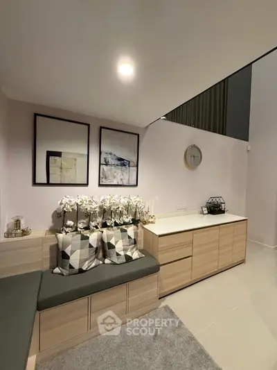 Modern living room with stylish decor and ample storage space
