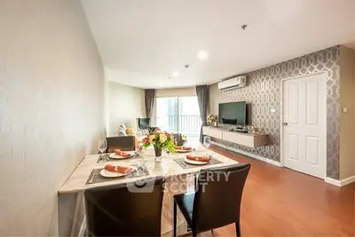 Spacious modern living room with elegant dining area and stylish decor