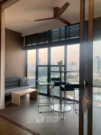 Chic modern living room with stunning city view and stylish furniture, perfect for urban living.