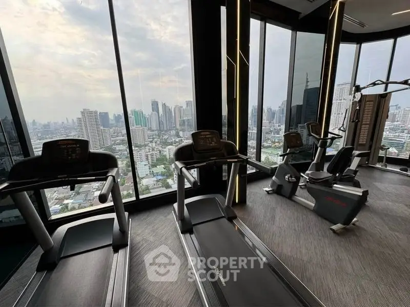 Modern gym with panoramic city views and state-of-the-art equipment