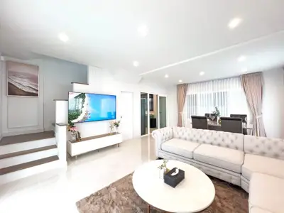 Spacious modern living room with elegant decor and natural light