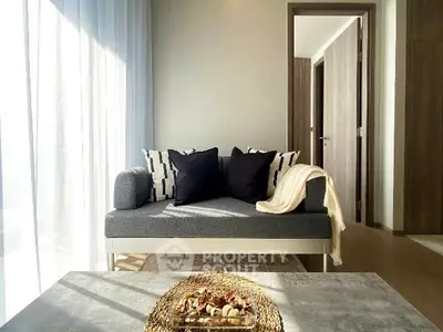 Modern living room with stylish sofa and natural light