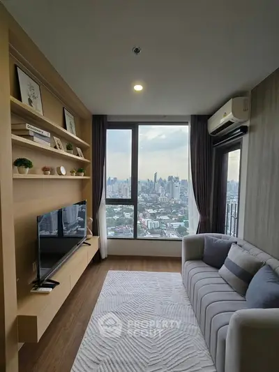 Stylish living room with city view, modern decor, and cozy seating in high-rise apartment.