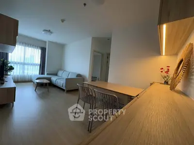 Modern living room with stylish furniture and natural light, perfect for relaxation and entertaining.