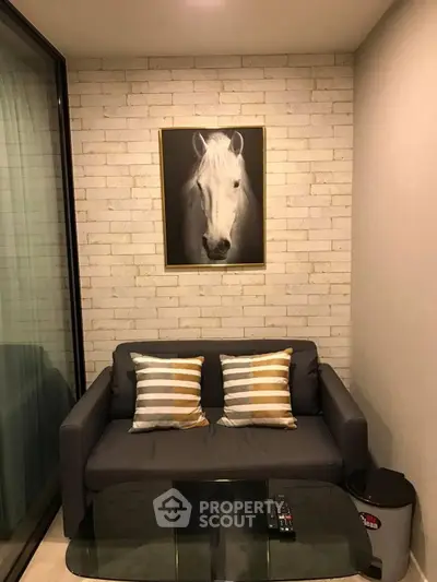 Cozy living room with stylish decor and horse artwork