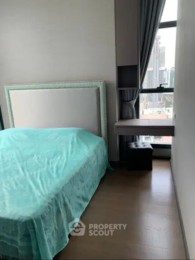 Modern bedroom with city view and stylish decor