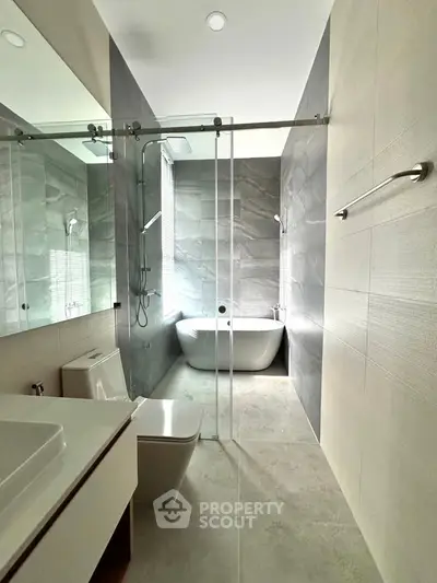Luxurious modern bathroom with sleek design and freestanding bathtub