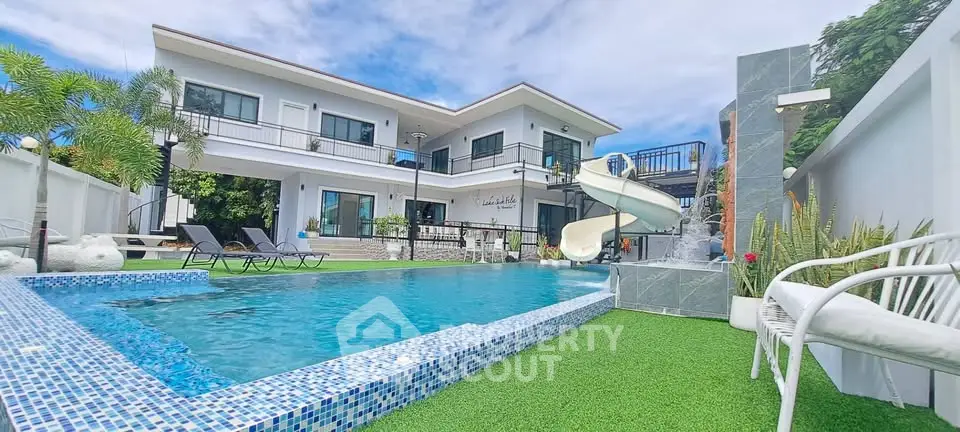 Luxurious villa with private pool and slide, perfect for family retreats.