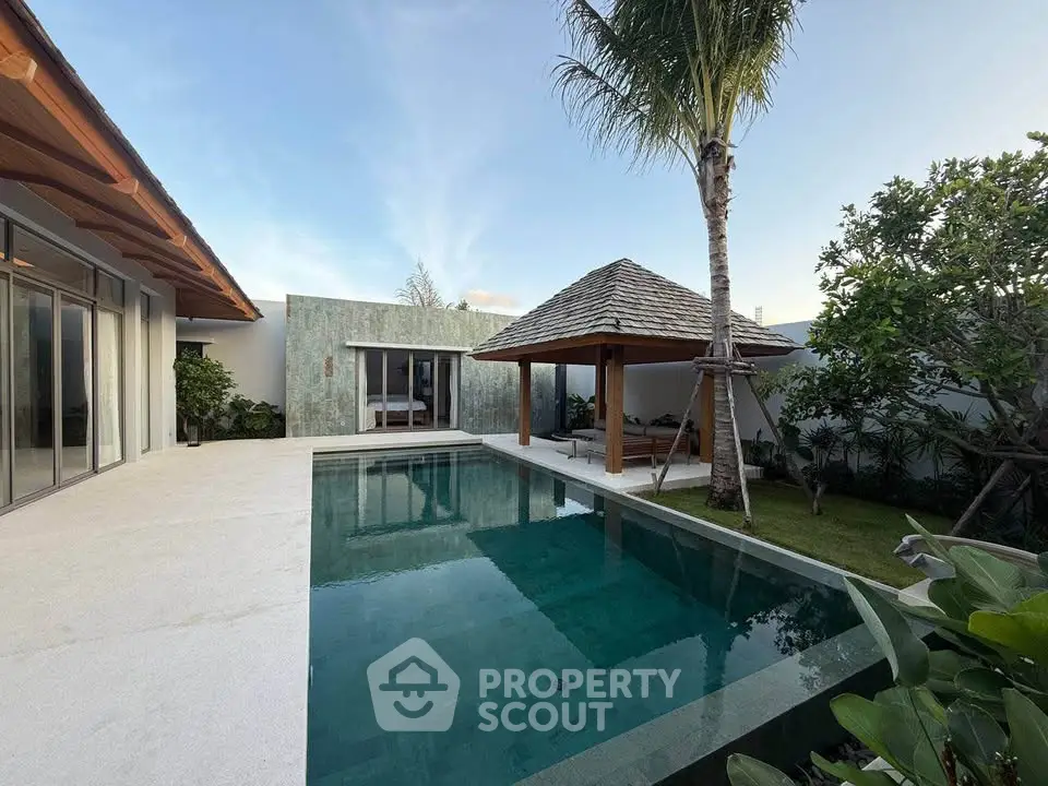 Luxurious villa with private pool and lush garden, perfect for relaxation and entertainment.