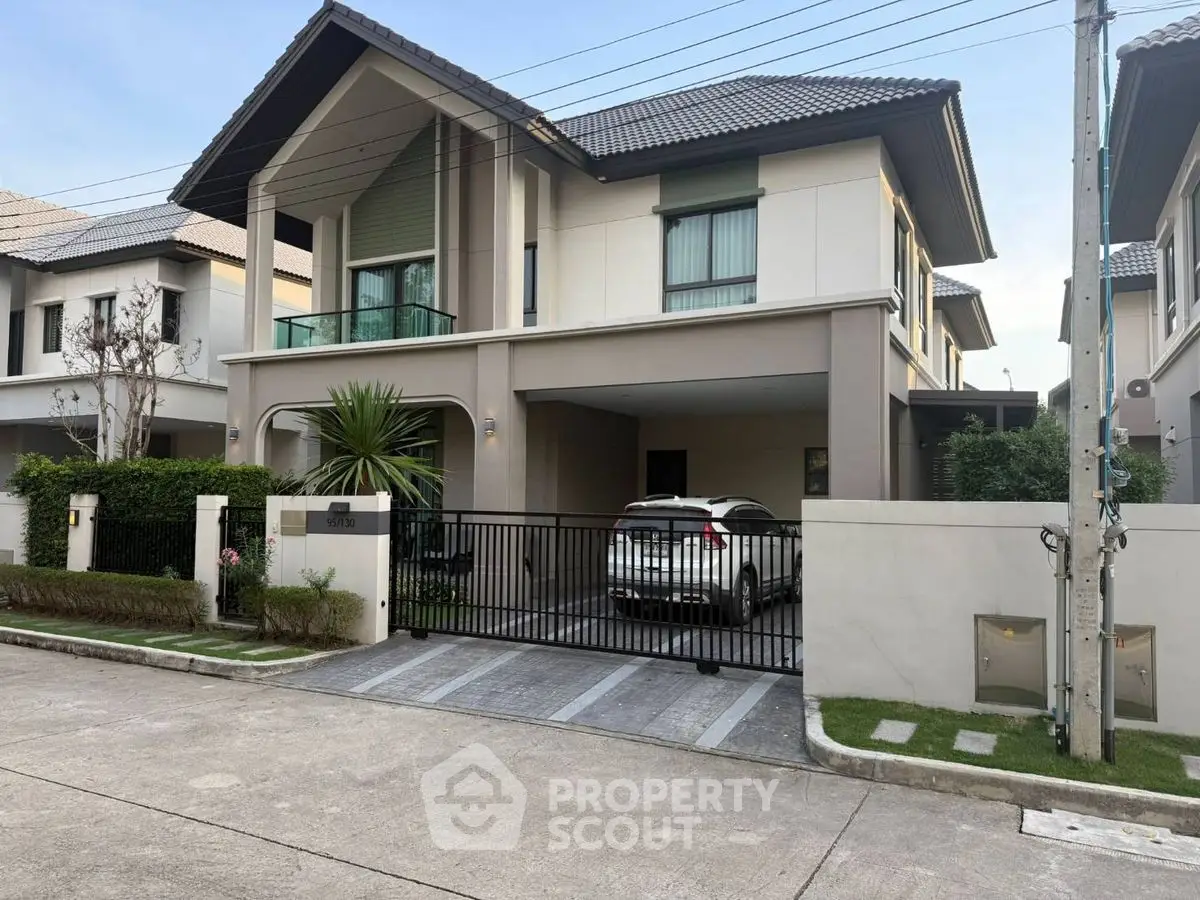 Modern two-story house with driveway and car, featuring sleek design and lush greenery in a serene neighborhood.