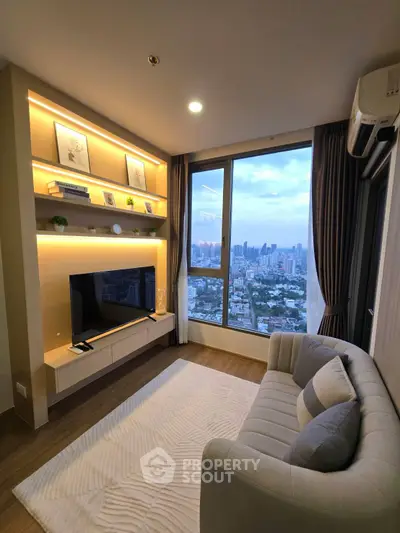Modern living room with city view, featuring stylish decor and large window for natural light.