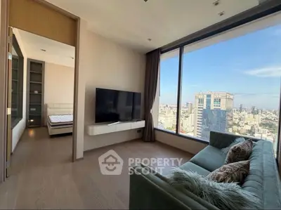 Luxurious high-rise apartment with stunning city view and modern interior design.
