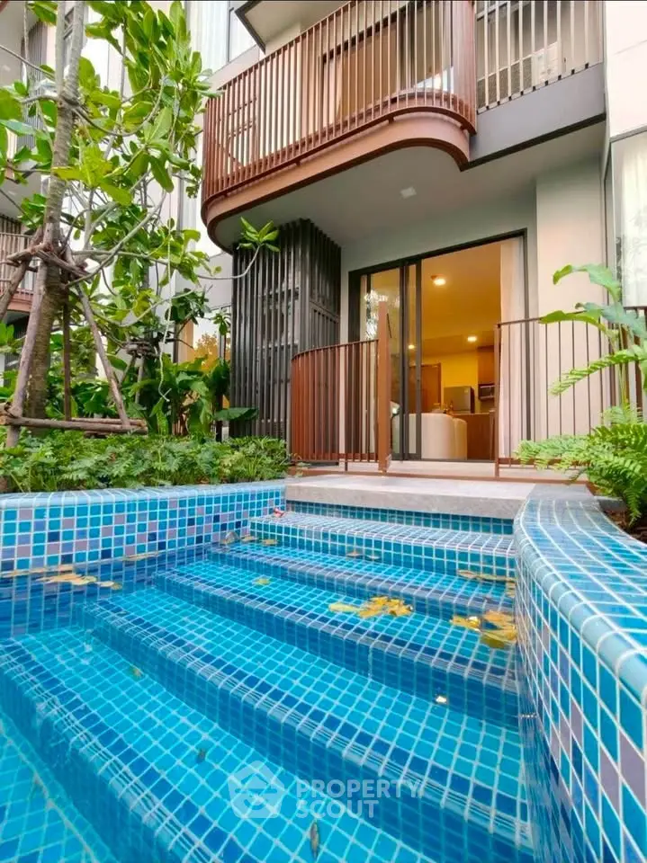 Luxurious apartment with private pool and lush garden view