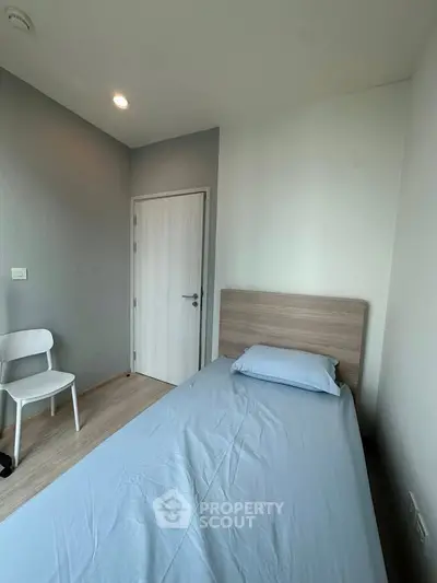 Cozy minimalist bedroom with modern decor and natural light