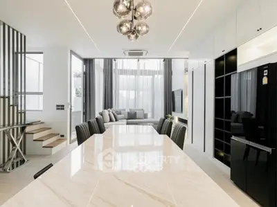 Luxurious modern living room with elegant dining area and stylish decor