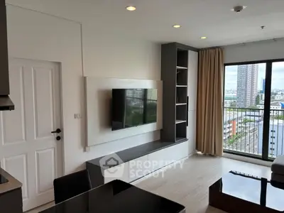 Modern living room with wall-mounted TV and city view balcony