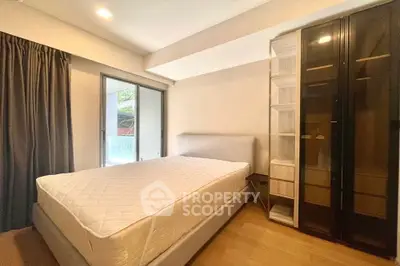 Modern bedroom with sleek design and two beds, perfect for comfort and style.