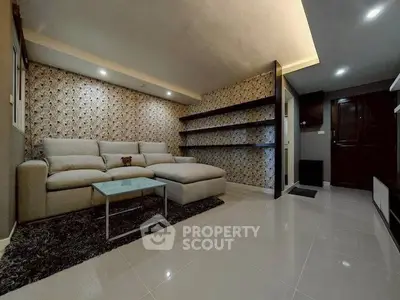 Spacious modern living room with elegant decor and comfortable seating