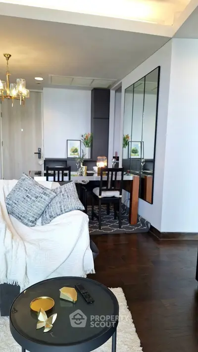 Stylish modern living room with elegant dining area and chic decor
