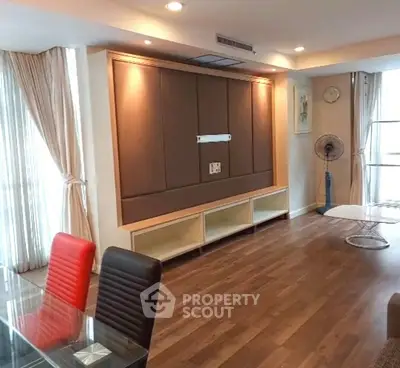 Modern living room with stylish furniture and hardwood flooring