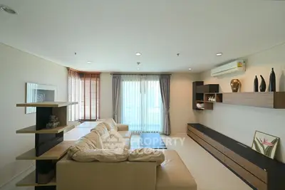 Modern living room with sleek furniture and natural light