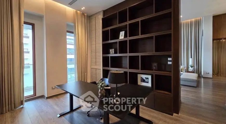 Luxurious home office with elegant shelving and modern decor