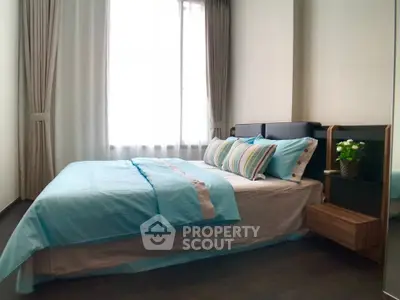 Cozy bedroom with stylish decor and natural light