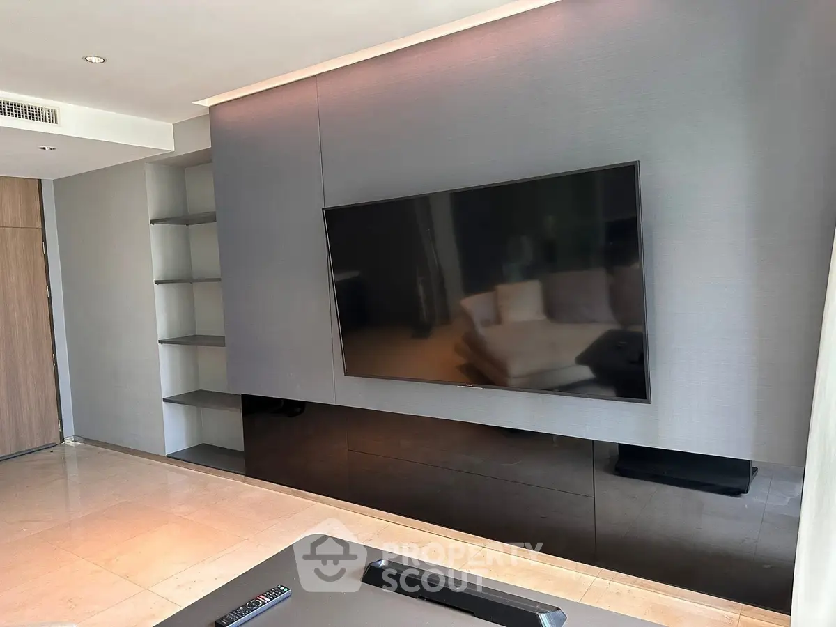 Modern living room with sleek TV setup and minimalist design